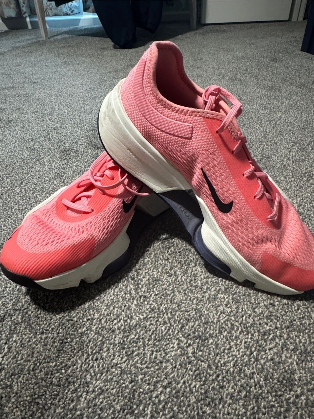 Nike Coral Pink Women's Athletic Running Shoes with Black Swoosh